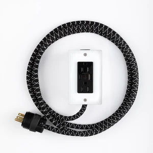 Dual outlet power cord with black-speckled braided cable and white outlet box