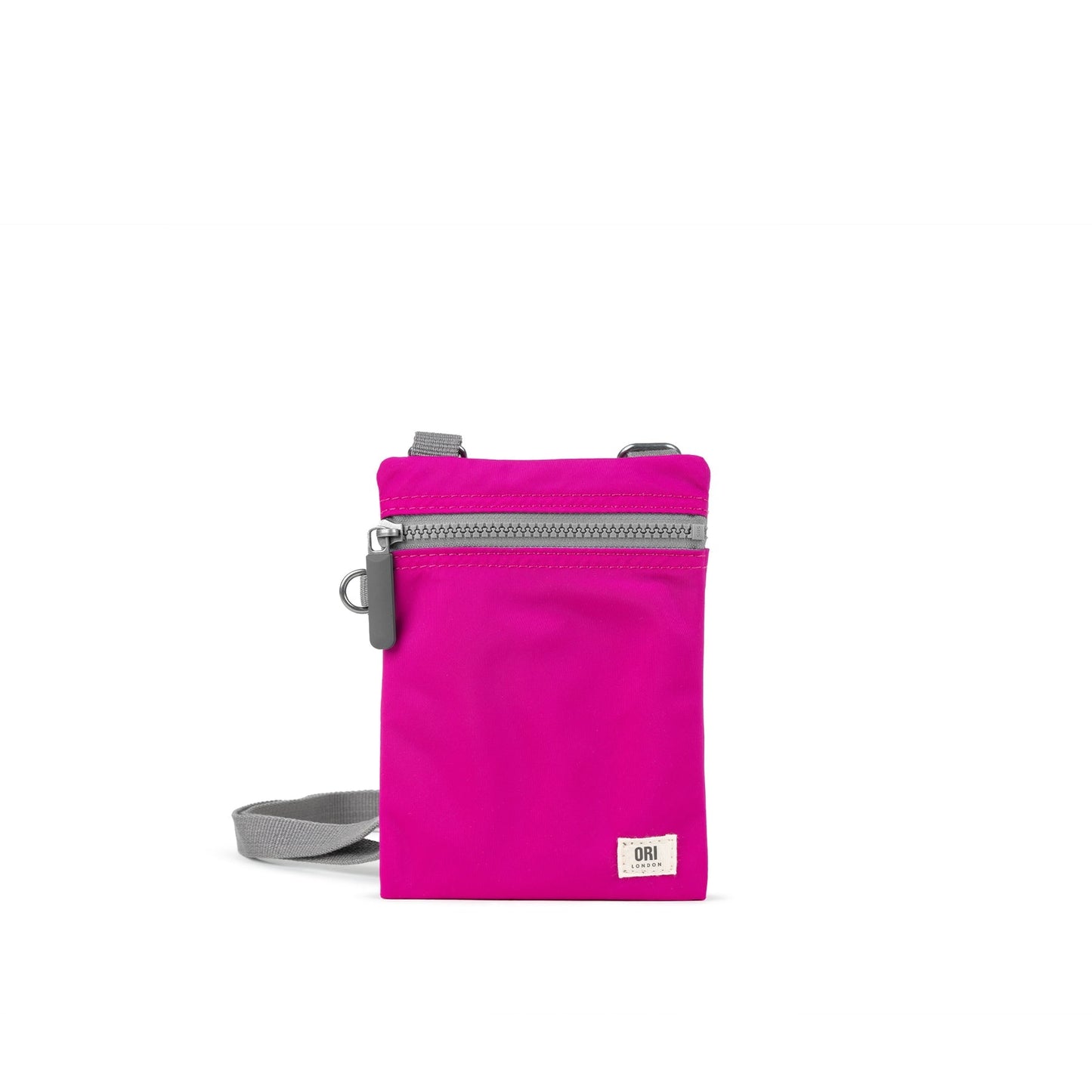 Hot pink recycled nylon pocket crossbody bag with zip top and gray adjustable strap