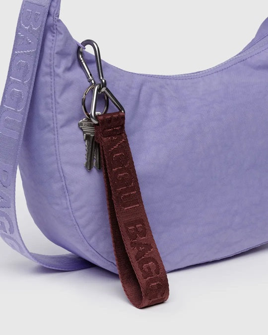 Brown logo keychain strap with metal clips on keyring