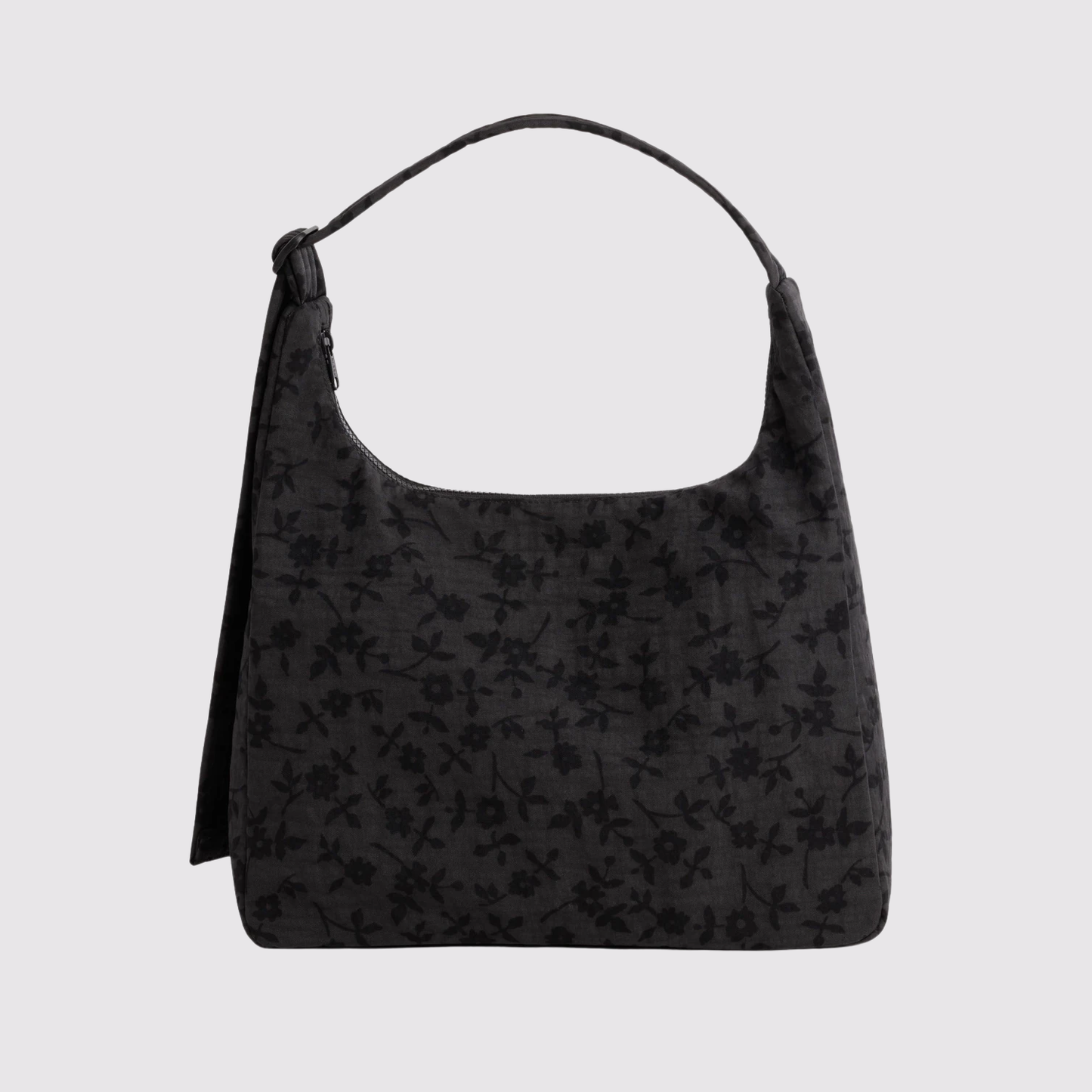 Black nylon shoulder bag with subtle dark floral print and wide zip-top opening.
