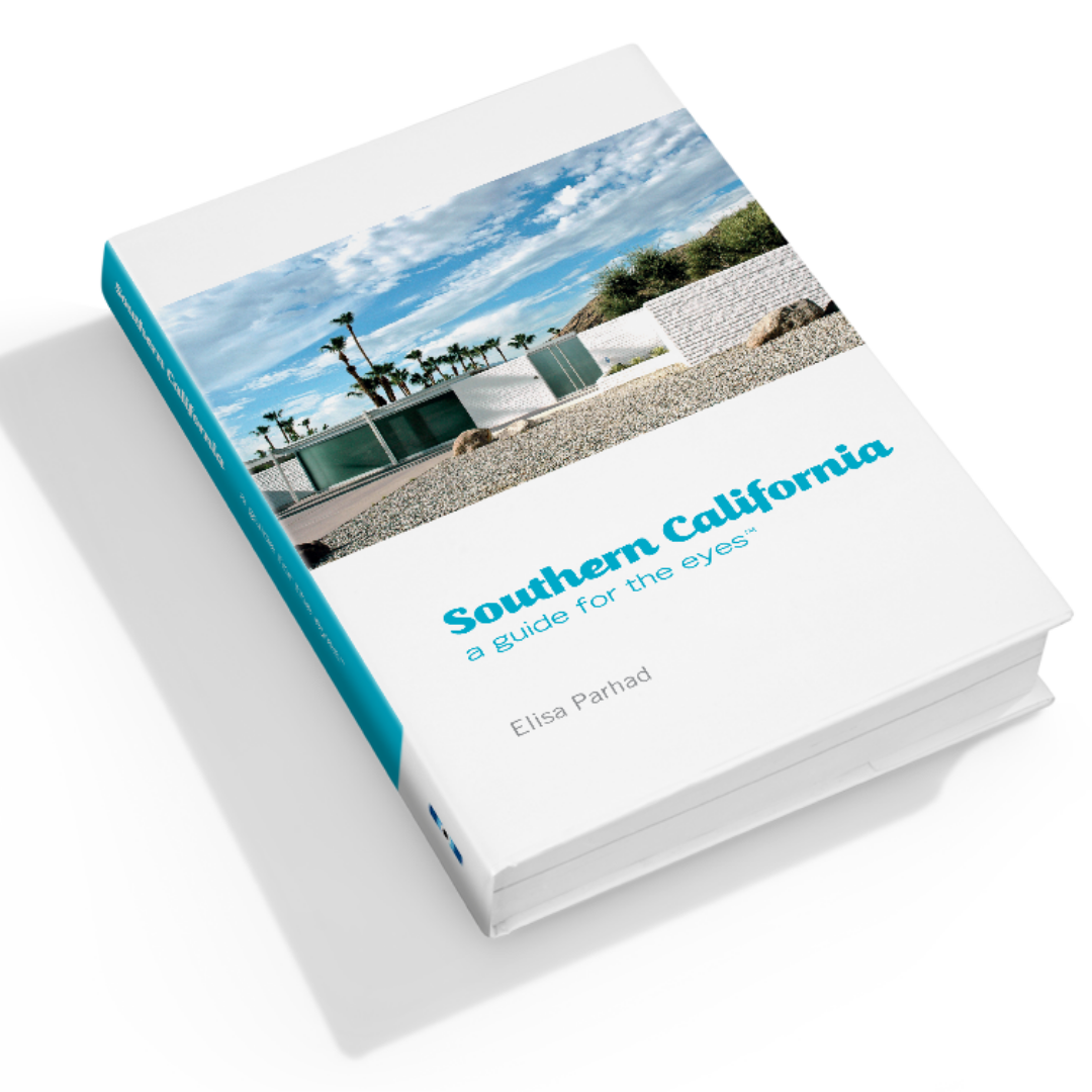Hardcover guide book angled view with beach photo cover and turquoise title