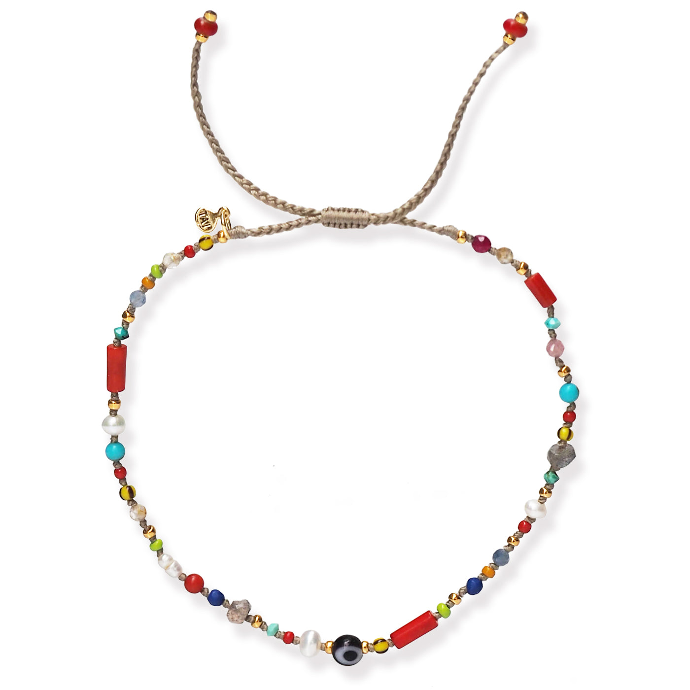 Multicolor beaded bracelet with small round black-and-white charm at center