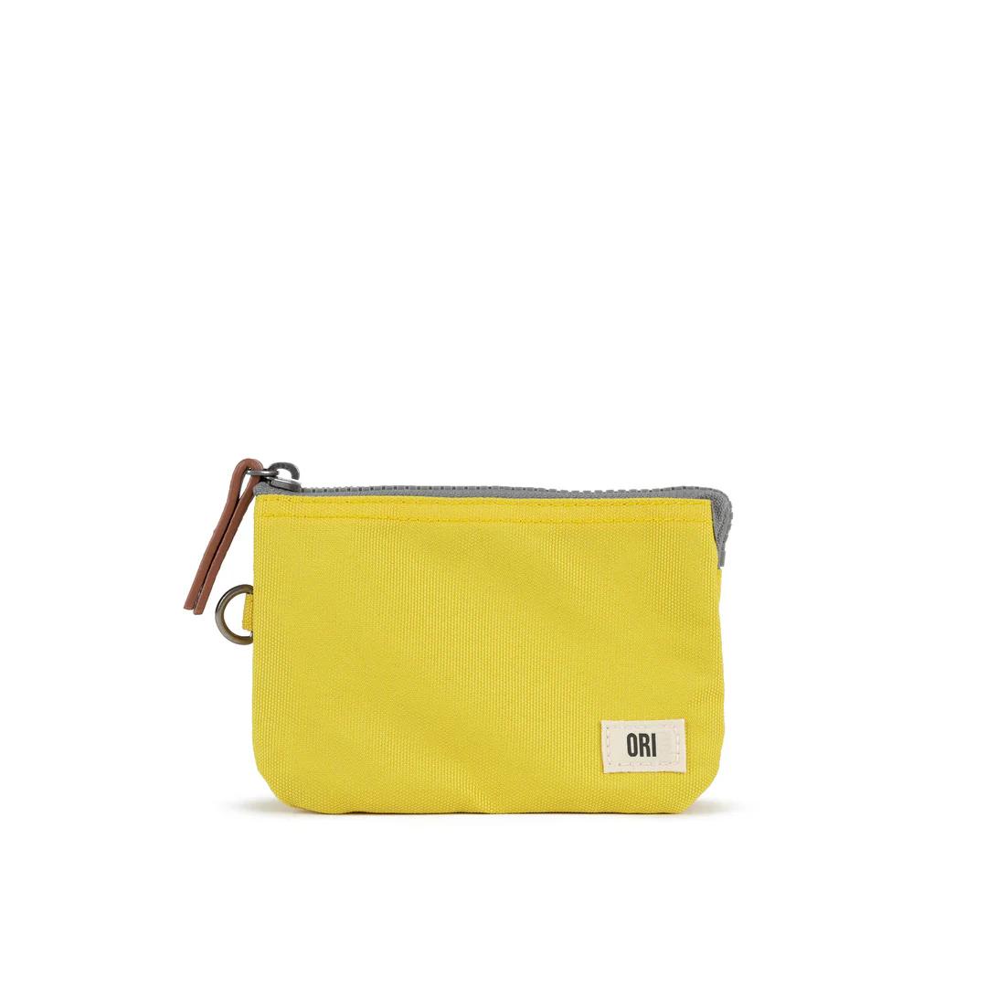 Small yellow canvas zipper pouch with brown zipper pull and ORI label at front