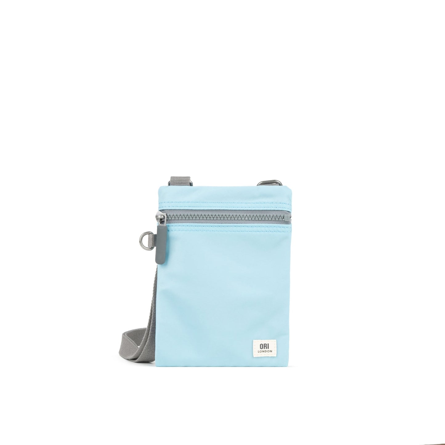 Light blue recycled nylon crossbody bag with front zip pocket, gray strap, logo tag