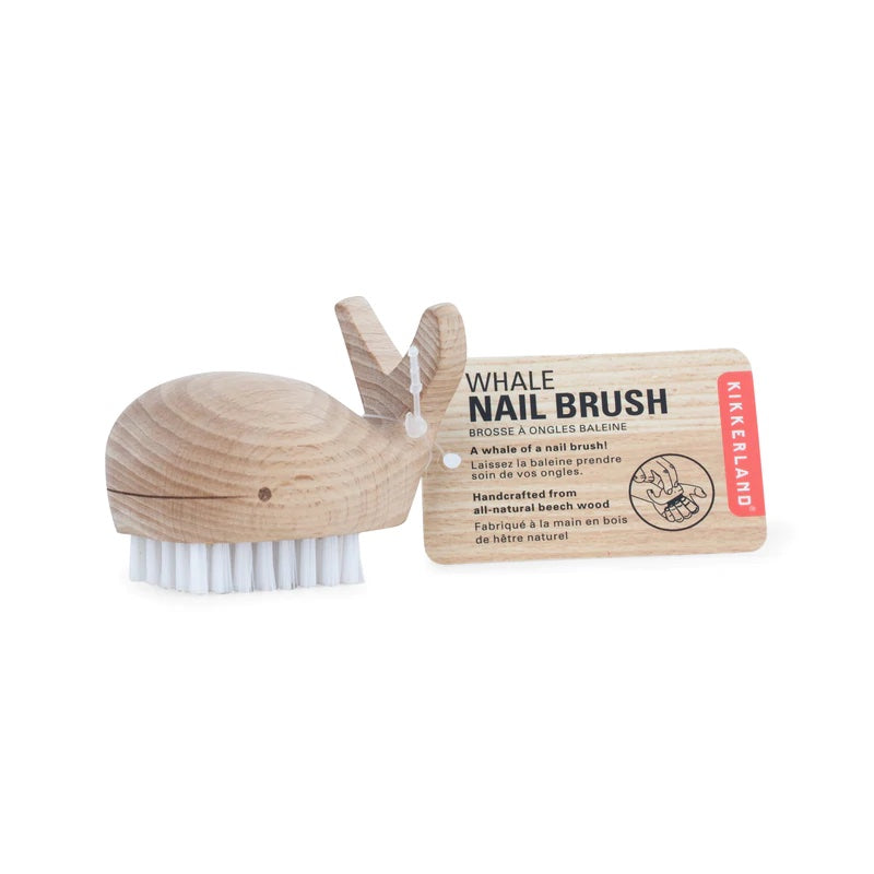 Wooden whale nail brush with white bristles, card package shown