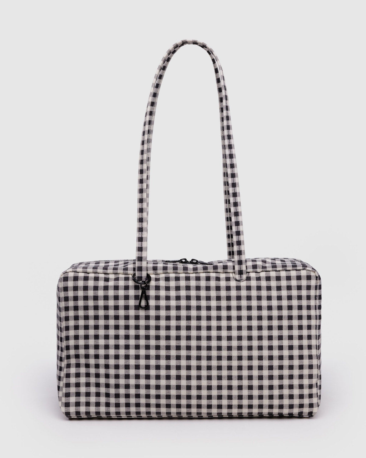 Medium nylon bowler bag in black-and-white gingham with top zipper and carry handles.