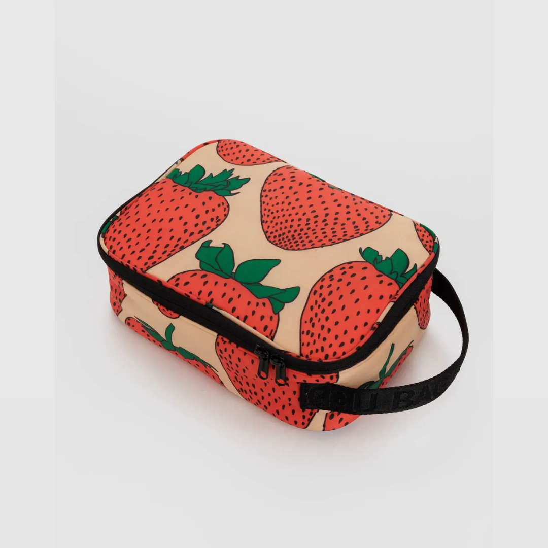 Strawberry patterned lunch bag with zip top and carry strap, black trim.