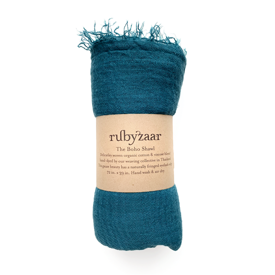 Boho cotton gauze shawl in dark teal with fringed edges, rolled for display