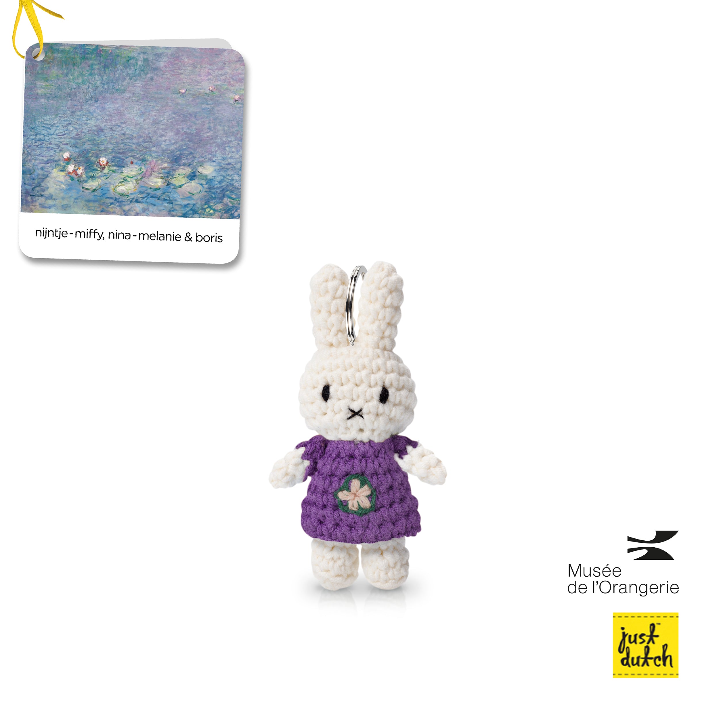 Handmade plush rabbit keychain, white with purple dress and small green flower