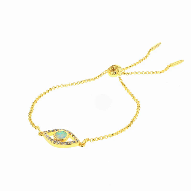 Gold-plated Pharaoh bracelet with blue teardrop pendant and chain links