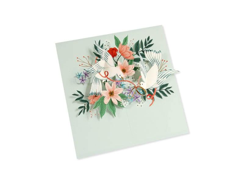 Light green wedding pop-up card showing lovebirds, blooms, and decorative foliage