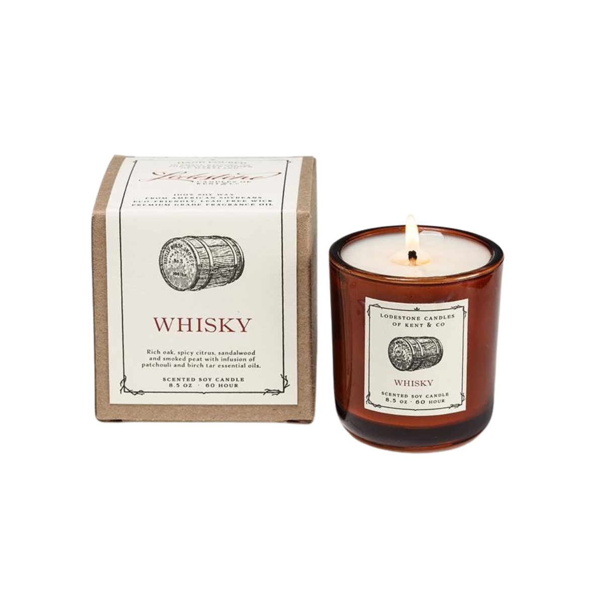 Soy candle in amber glass jar with lit wick, shown with kraft cardboard box