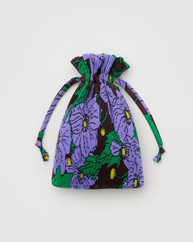 Pleated Baggu drawstring pouch with purple and green floral print, gathered top and cords