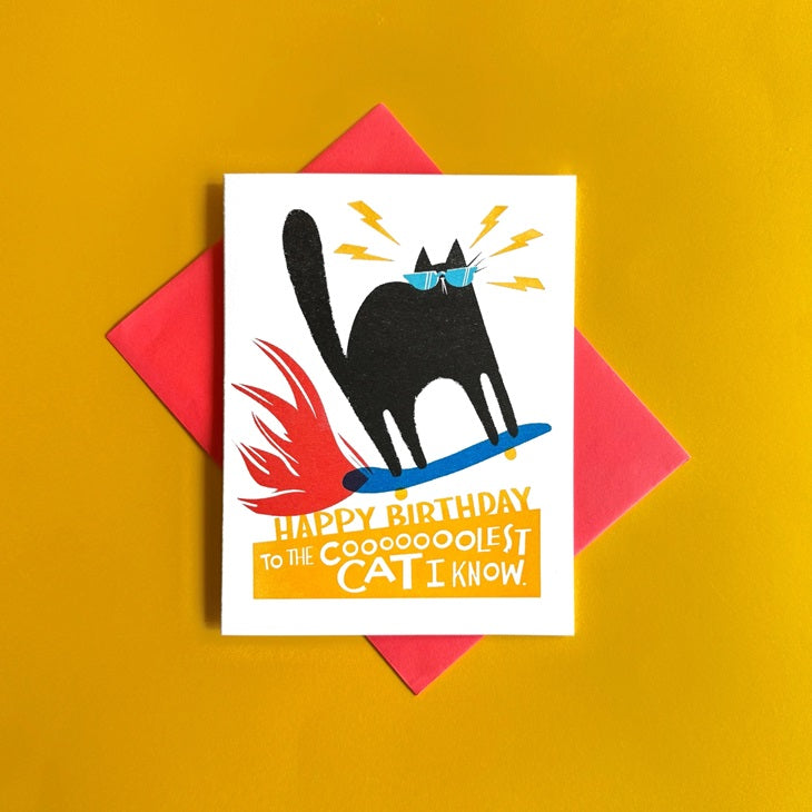 Happy birthday greeting card with black cat wearing bow tie and lightning graphics