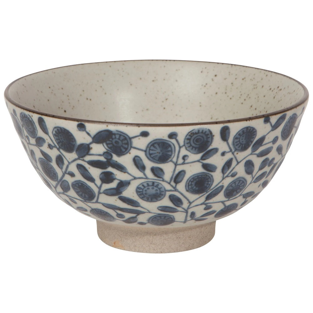 Large ceramic bowl with speckled stone finish and blue leaf and dot pattern