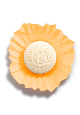 Orange round Neroli wellbeing soap with embossed Roger&Gallet logo on top