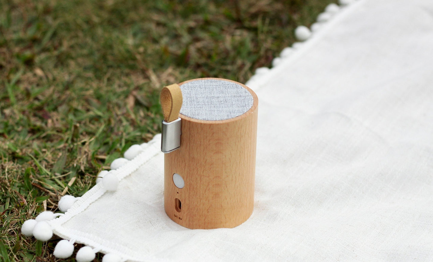 Beech wood drum speaker on outdoor fabric with fabric top and metal side latch