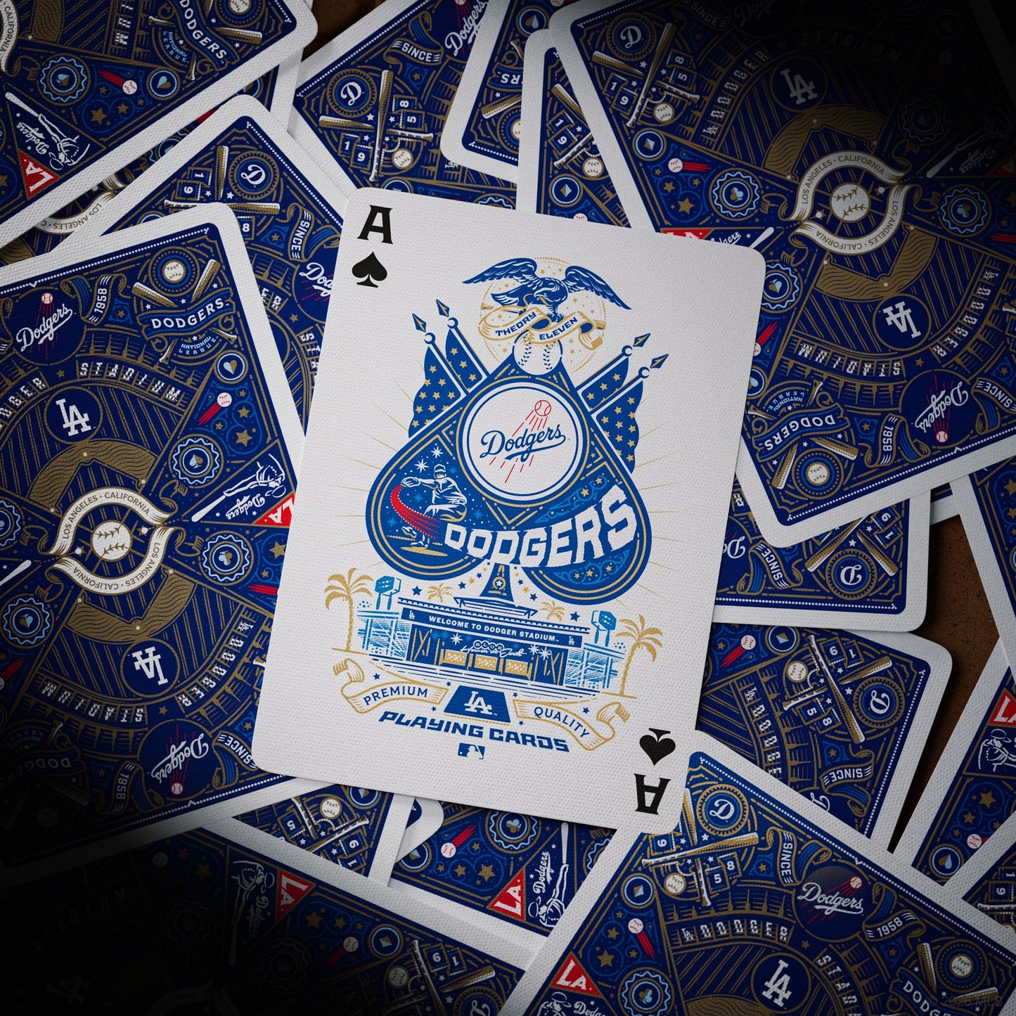 Assorted Dodgers playing cards with an Ace of spades card in the foreground