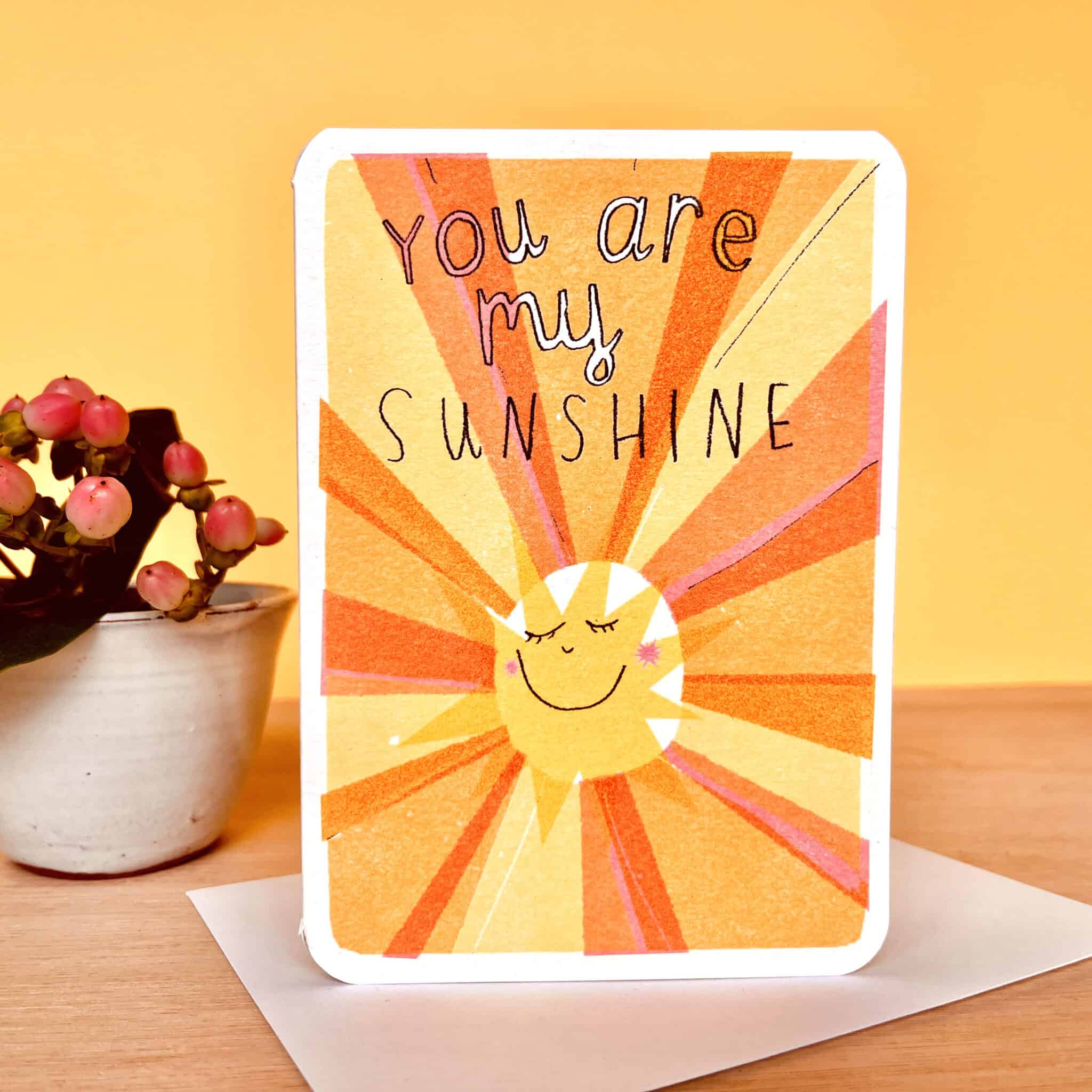 Sunshine greeting card with 'You are my Sunshine' text and orange sun rays illustration