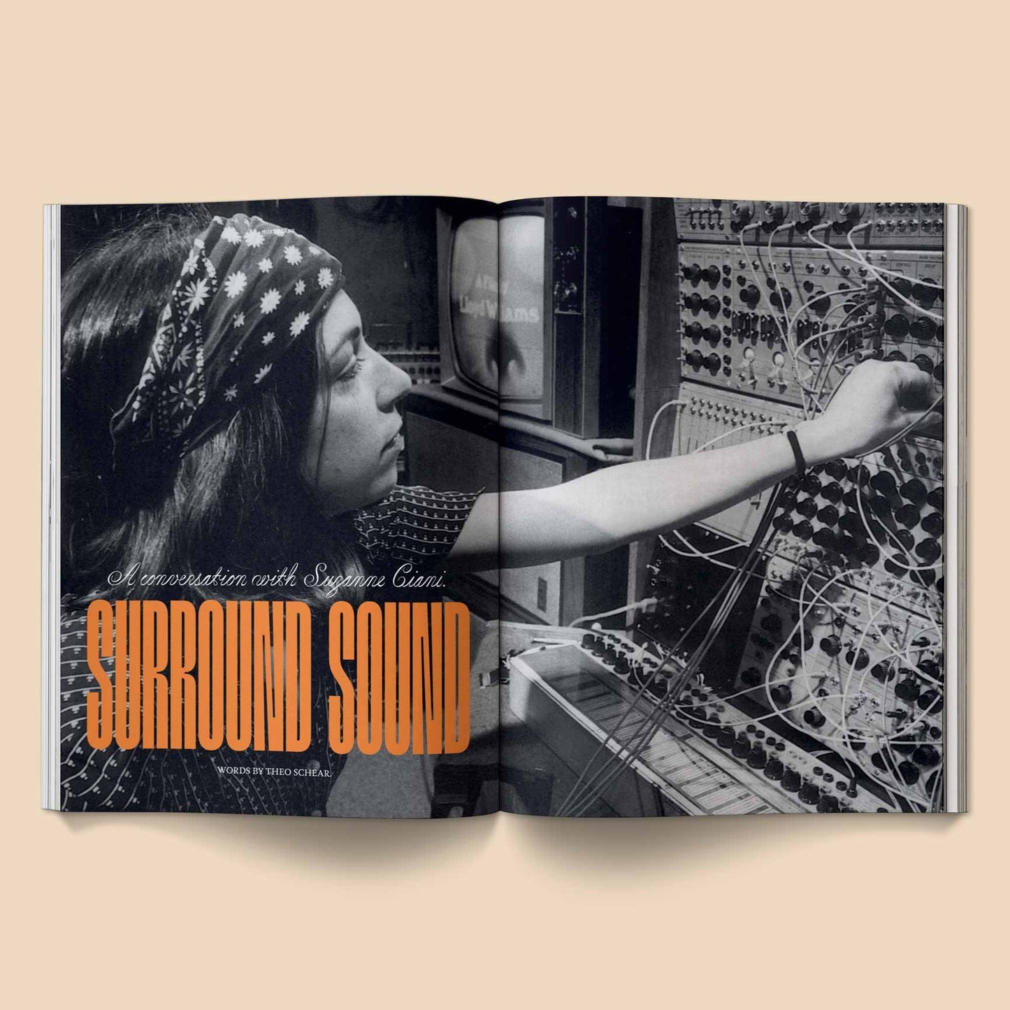 Opened music magazine spread titled "SURROUND SOUND" with black-and-white synth image