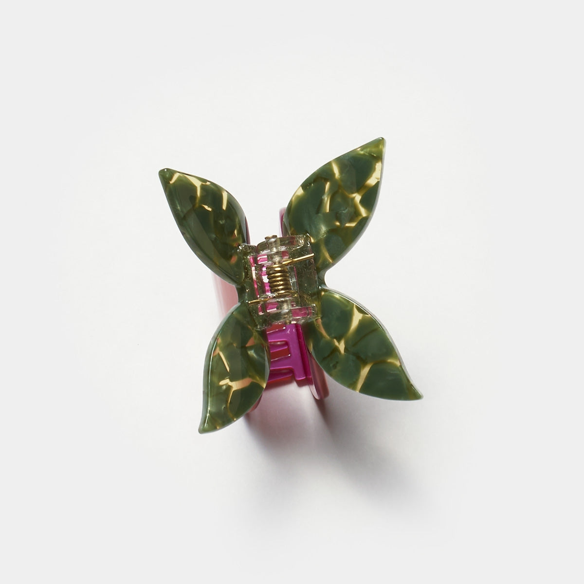 Butterfly hair claw with green marbled wings, purple base, and silver prongs