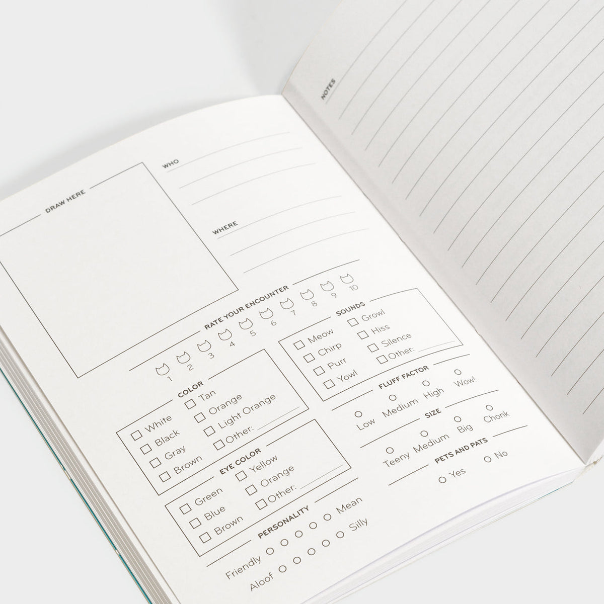 Open cat log pages with fill-in fields, ratings, and color checkboxes