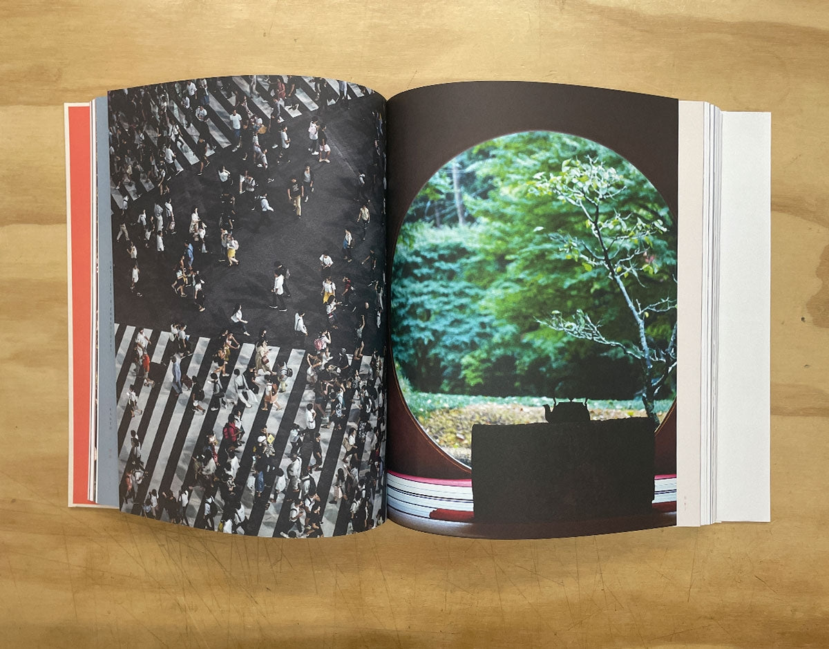 Open book spread with black patterned photo page on left and round nature photo on right