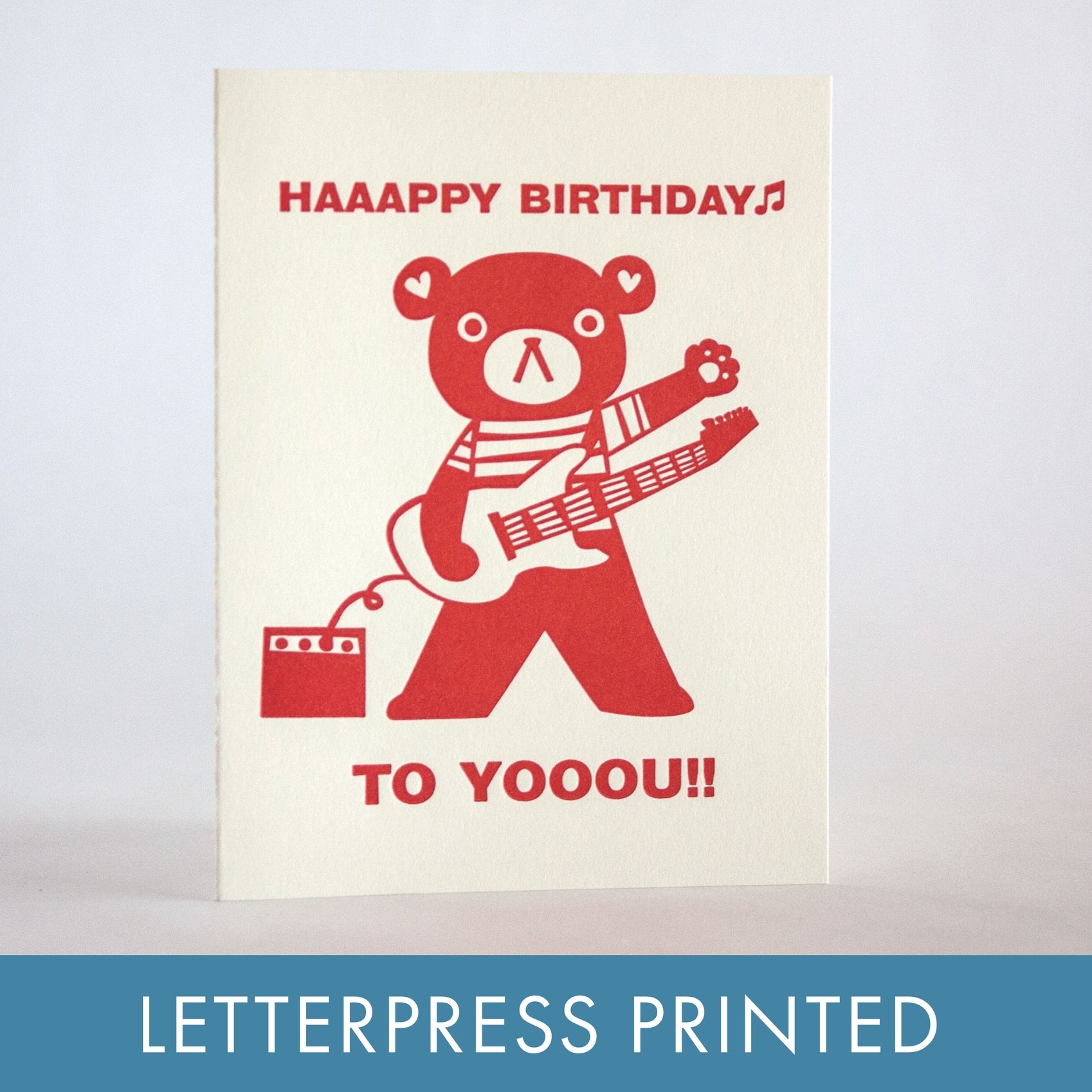 Letterpress birthday card, red bear with guitar and 'HAAAAPPY BIRTHDAY' text