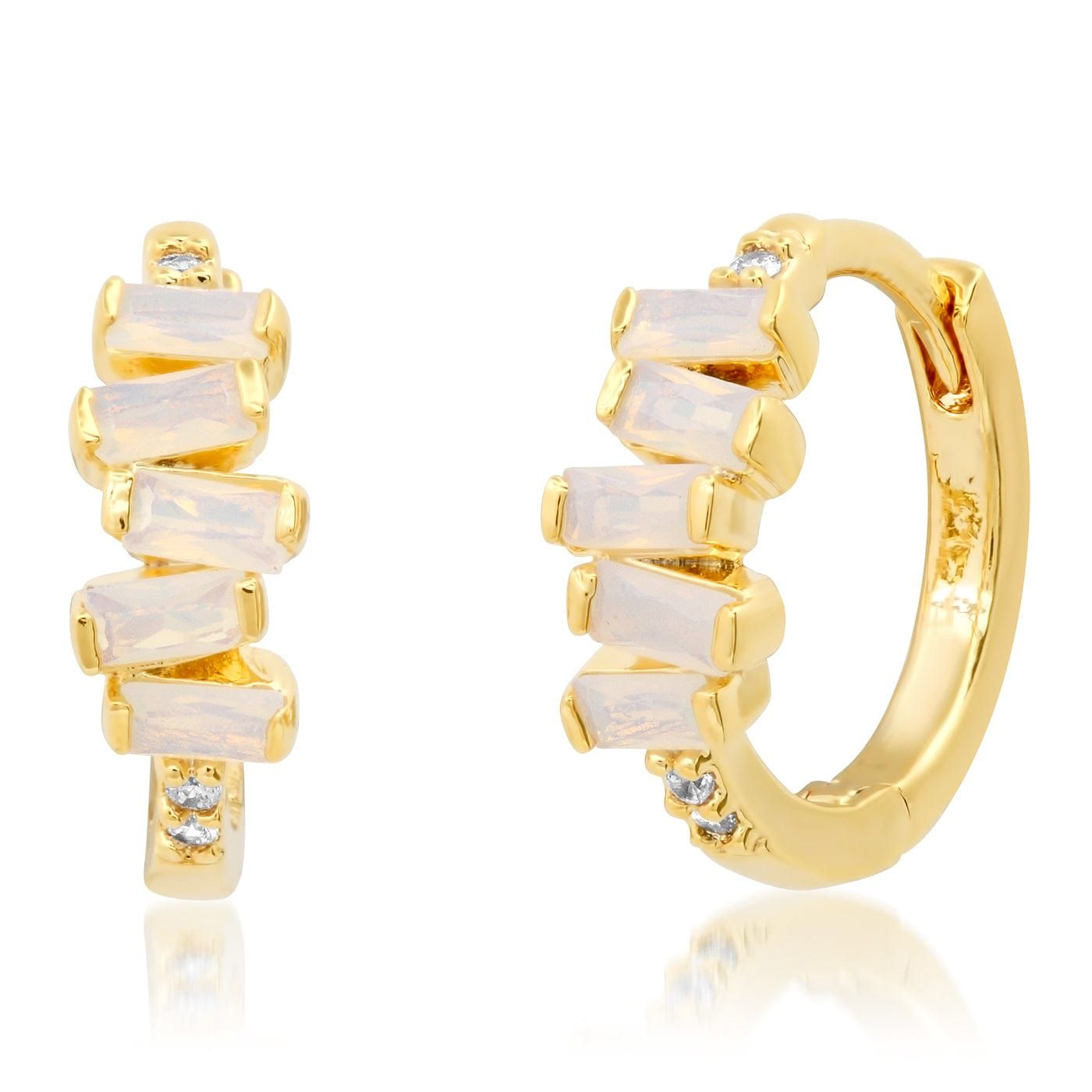 Gold huggie earrings with stacked baguette white stones and small sparkle details