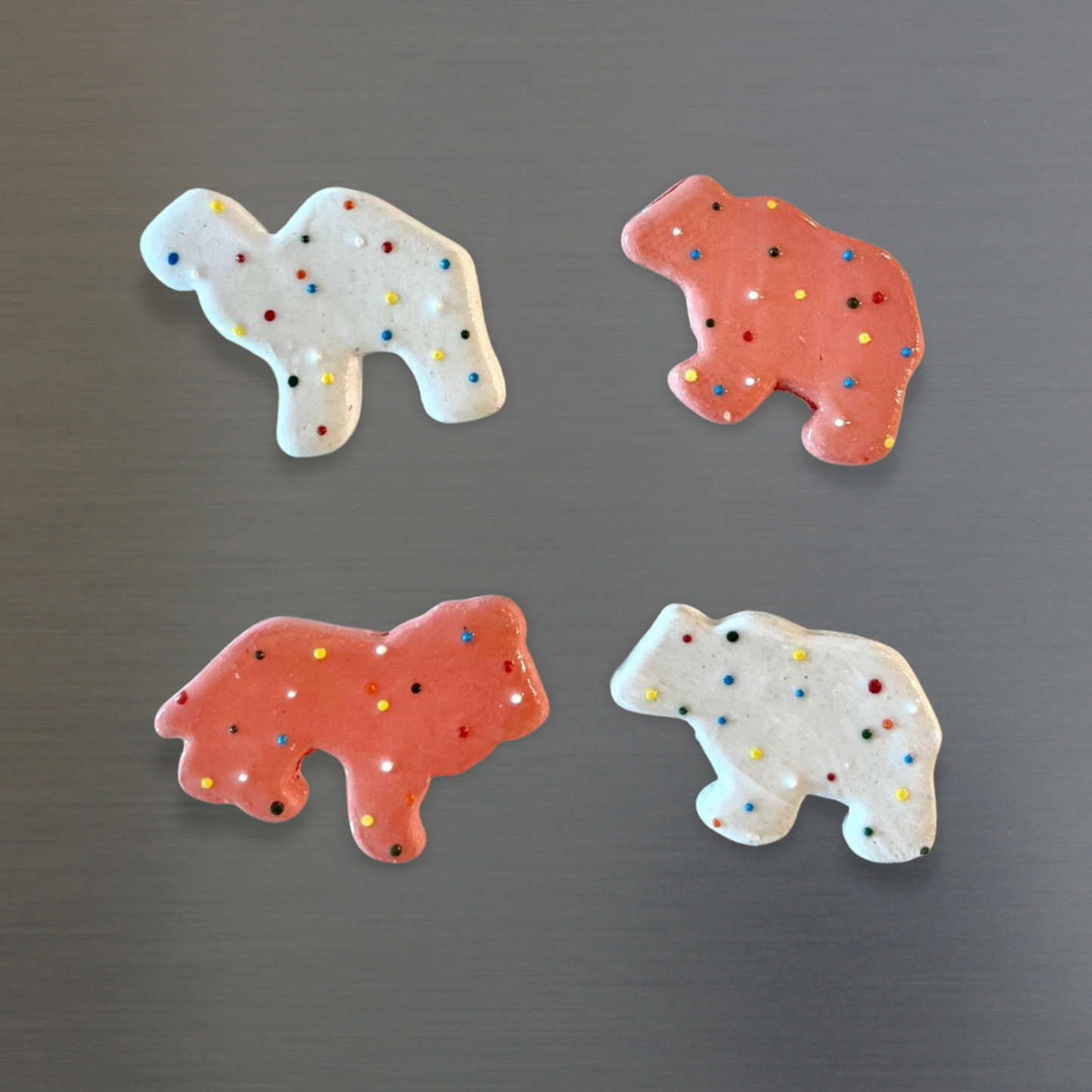 Animal cracker magnets set of 4 with pink and white frosted animal shapes