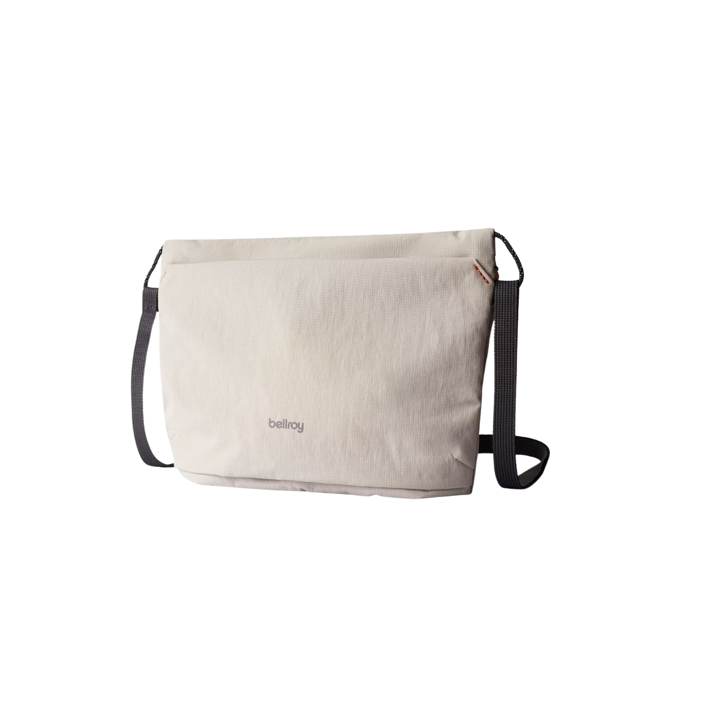 Light ash canvas crossbody bag with black trim, zip-top and adjustable shoulder strap