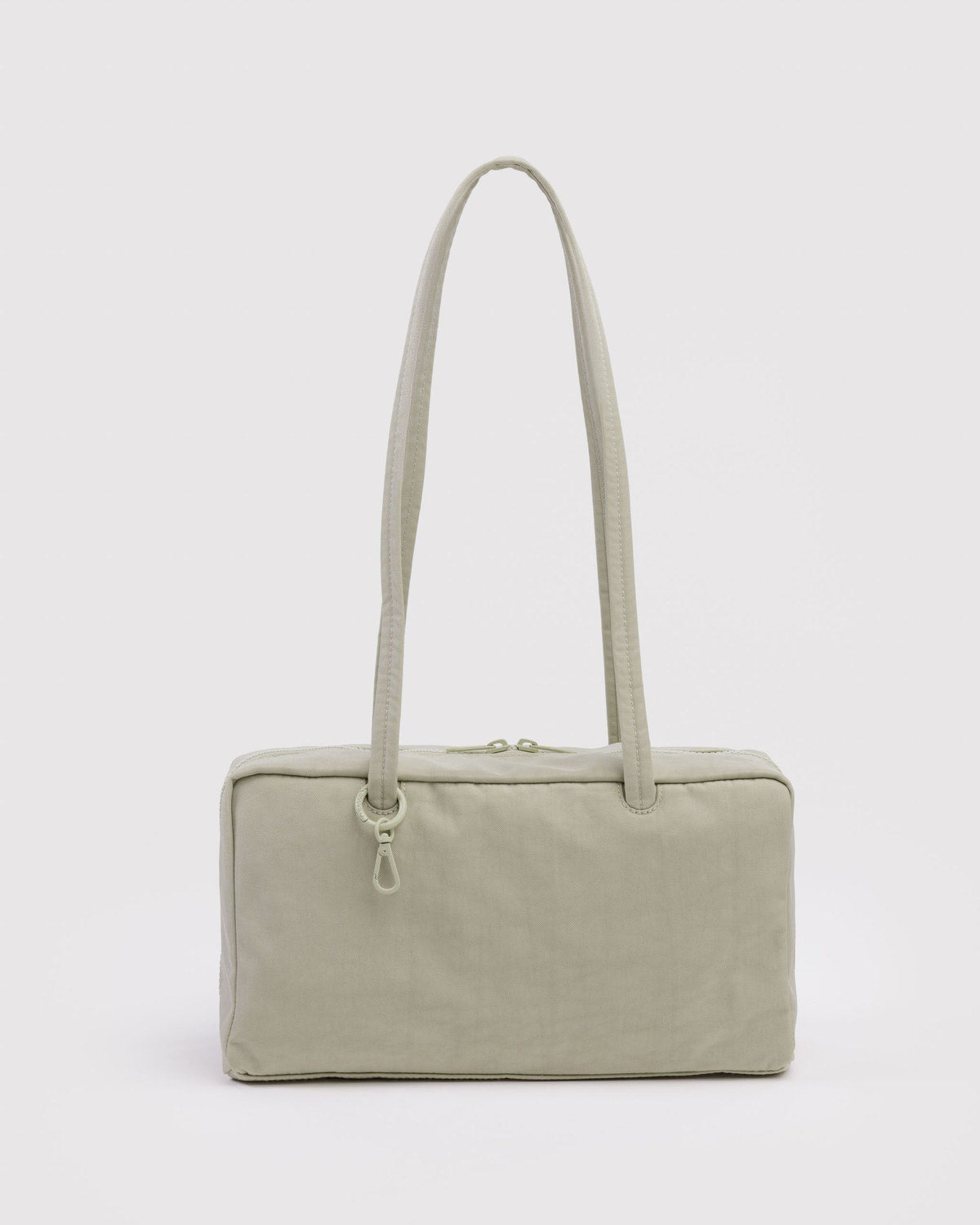 Light beige nylon bowler bag with top zipper and short carry handles