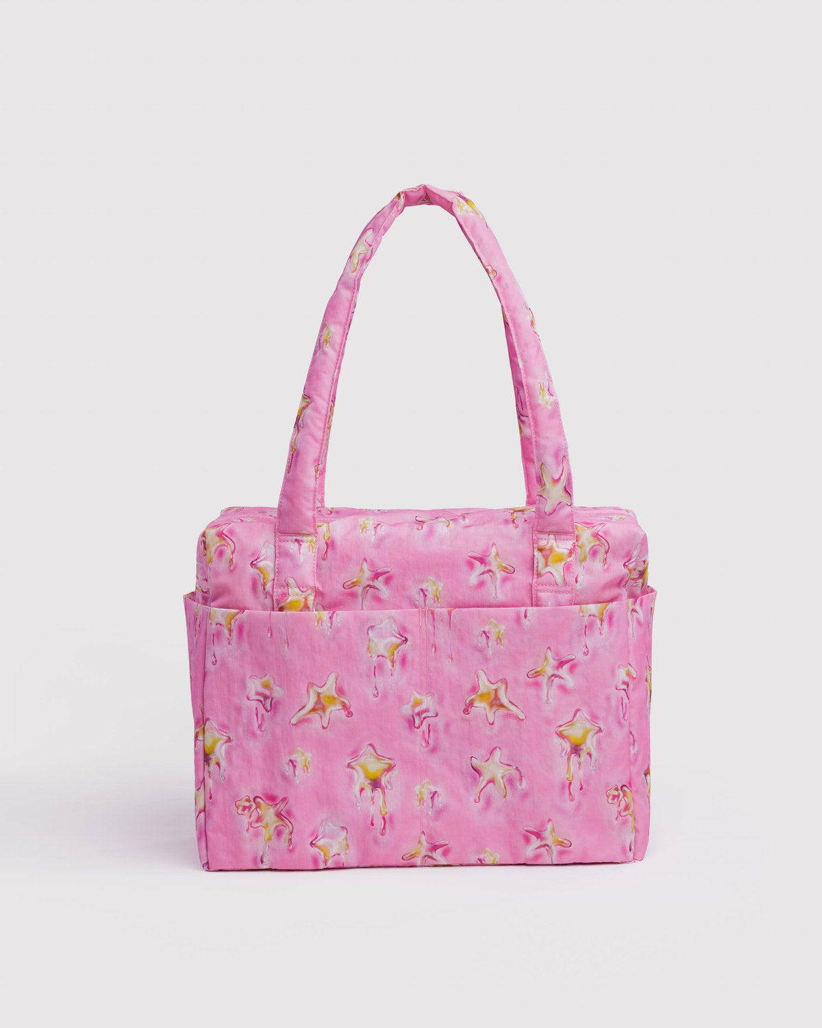 Small Cloud carry-on tote in pink with star print and top carry handles