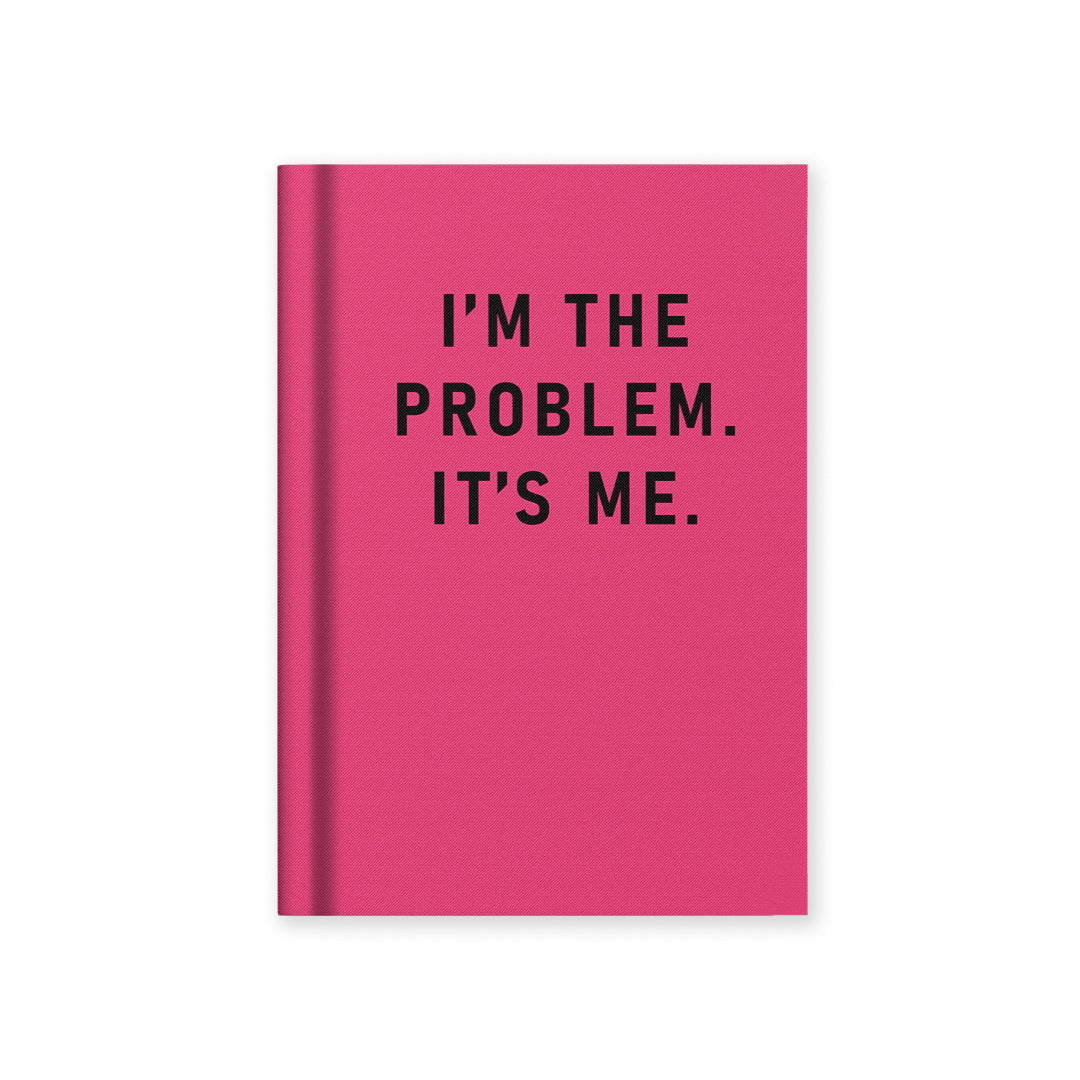 Hardback notebook with pink cover and black "I'M THE PROBLEM. IT'S ME" text