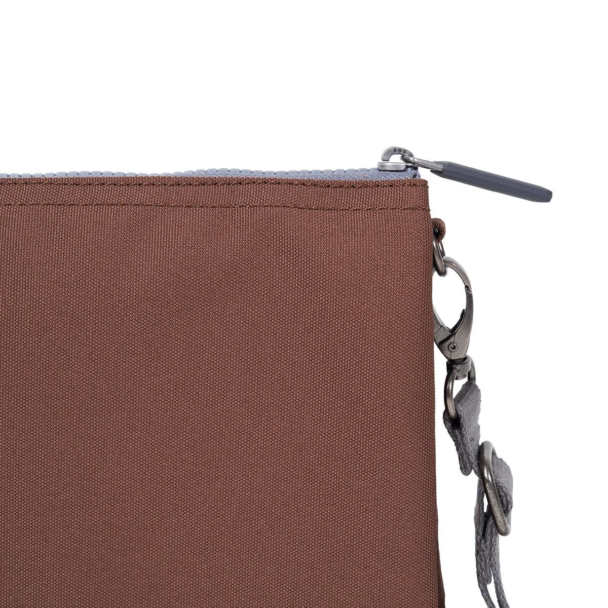 Medium canvas pouch close-up, brown fabric with zipper and metal hardware
