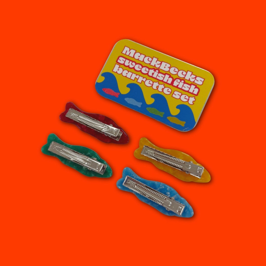Fish barrette set with metal tin and four fish-shaped hair clips