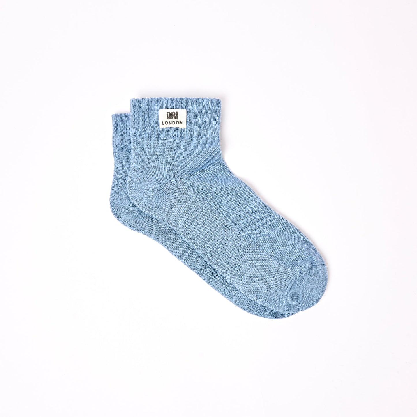 Men's ankle socks in airforce blue with ribbed cuff and heel-toe knit.