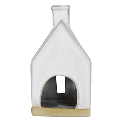 Ceramic cottage, white house decor with arched doorway and dark interior