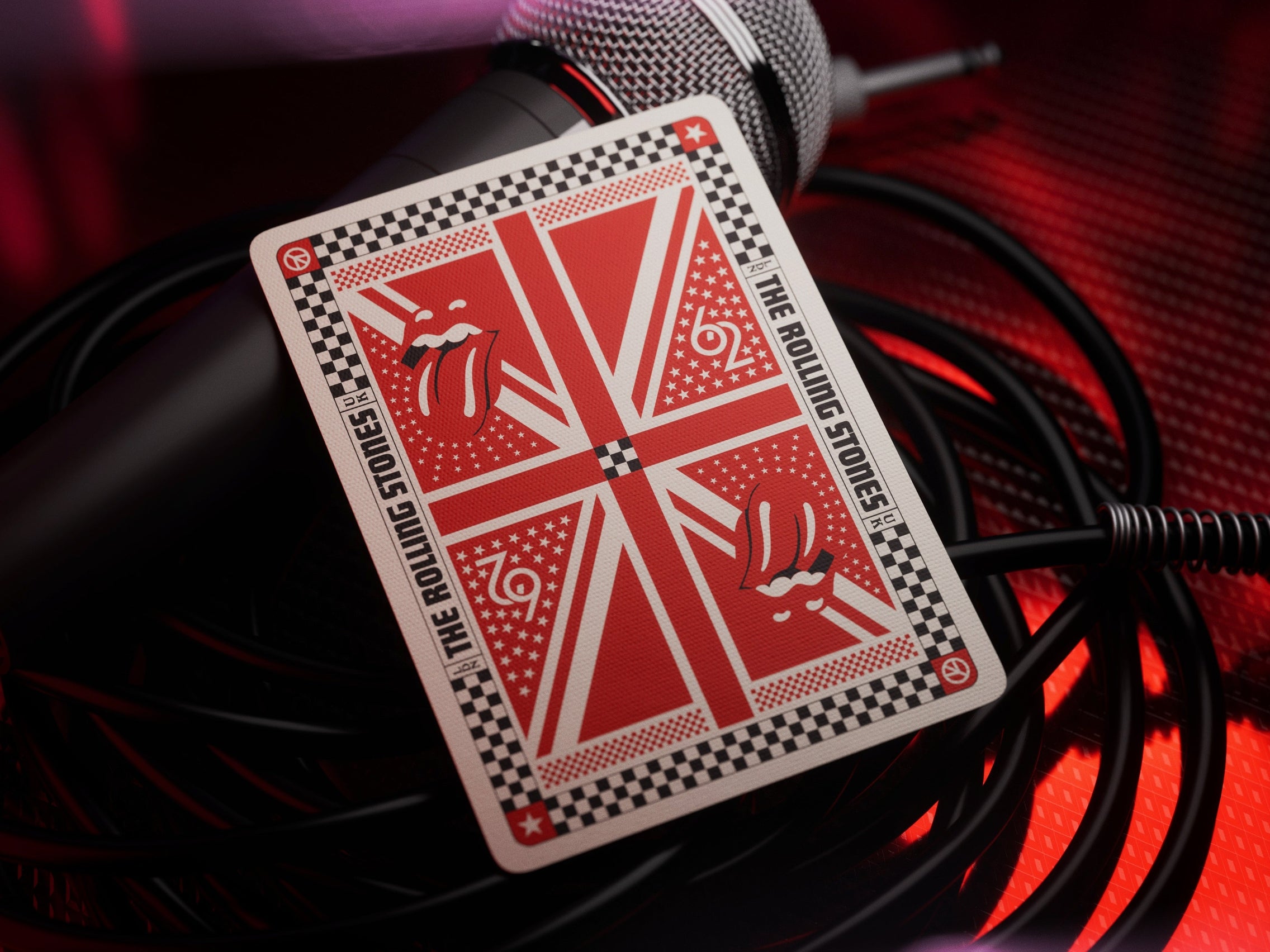 Playing card with red, white, and blue UK flag design and decorative border