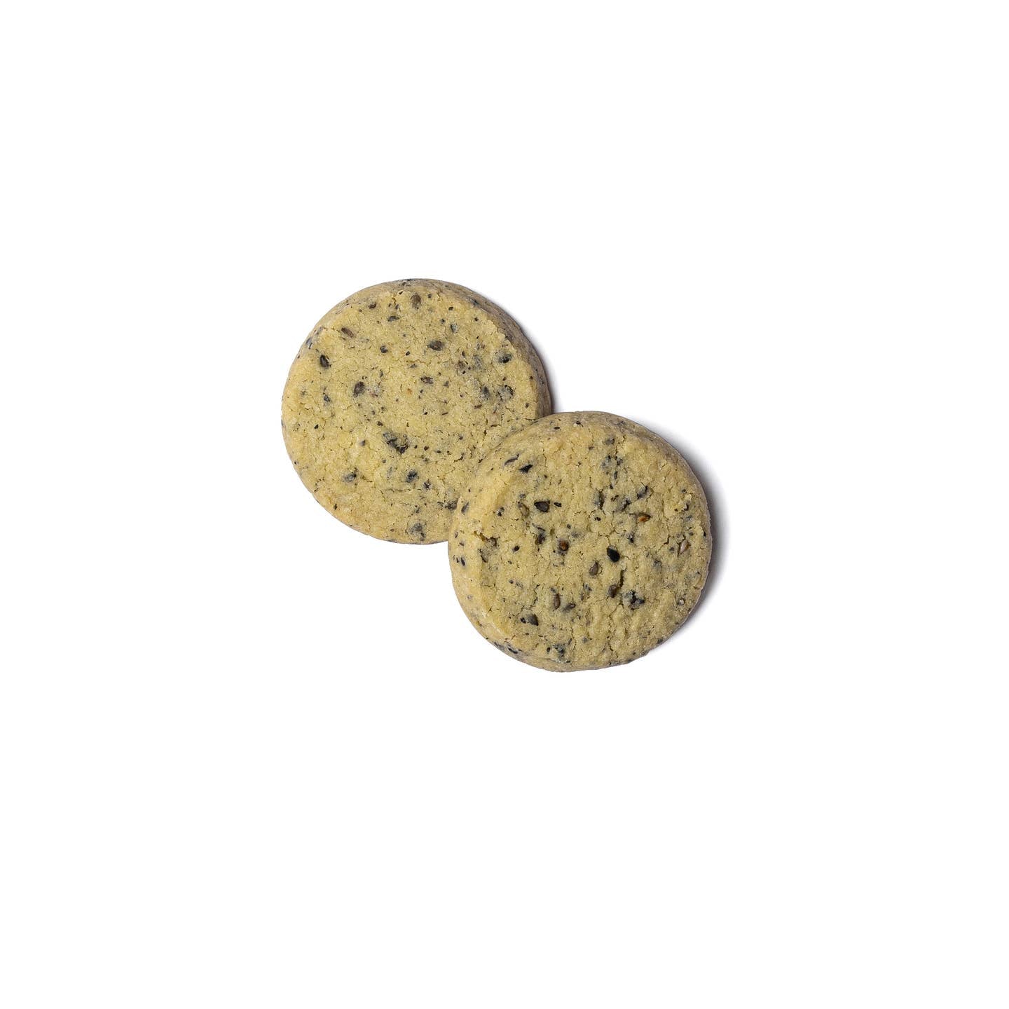 Round matcha black sesame cookies, two stacked