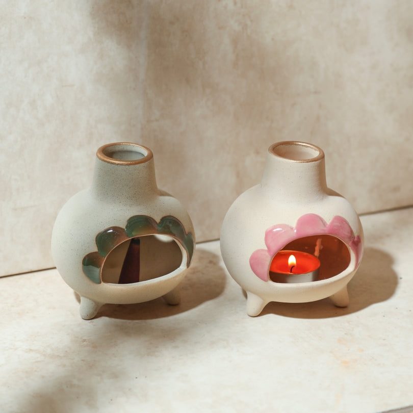 Ceramic incense chimney burner pair with green and pink petal cutouts