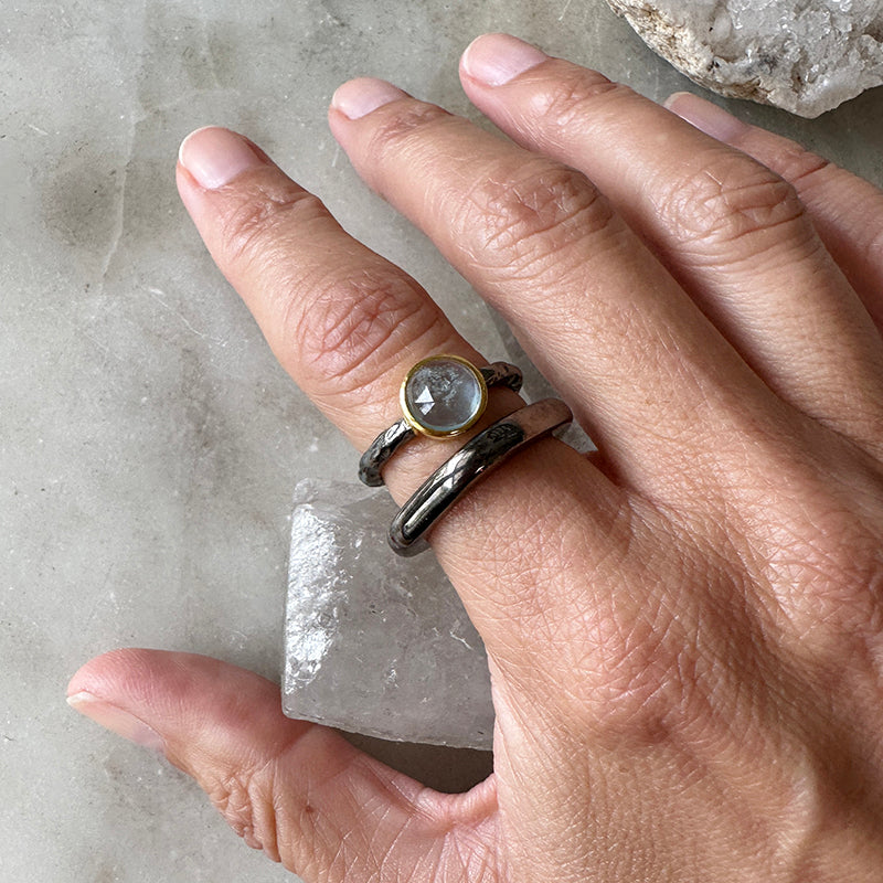 Oval aquamarine cabochon ring in oxidized sterling silver with gold vermeil setting