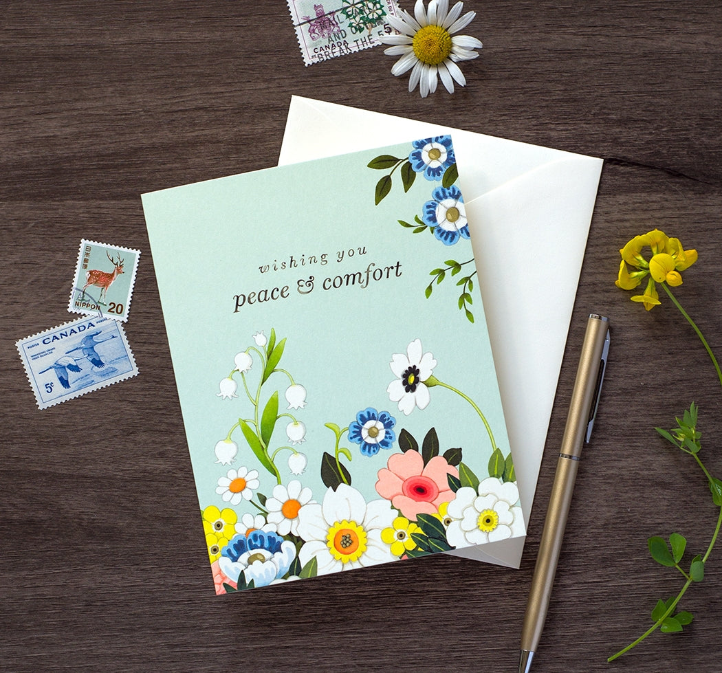 Floral greeting card with wishing you peace & comfort message and pastel blooms