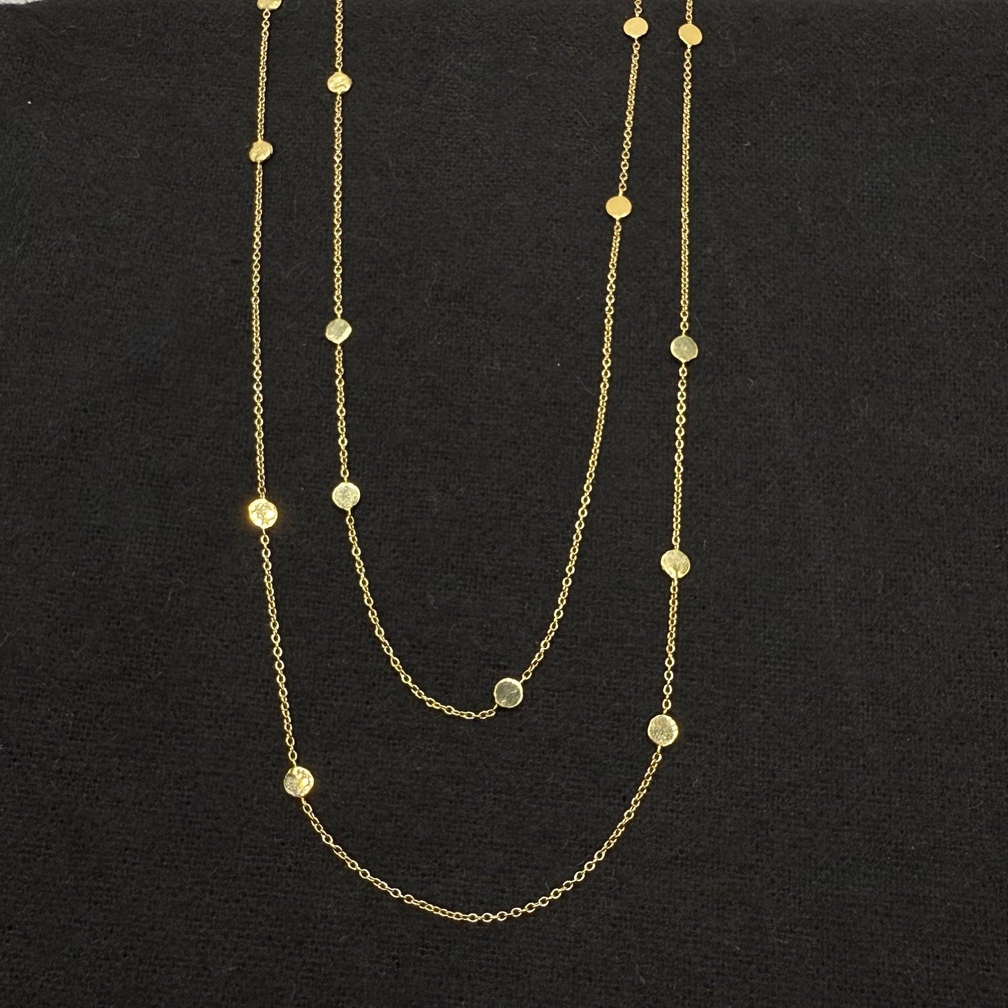 14k gold polka dot necklace with round bead stations on long chain strands