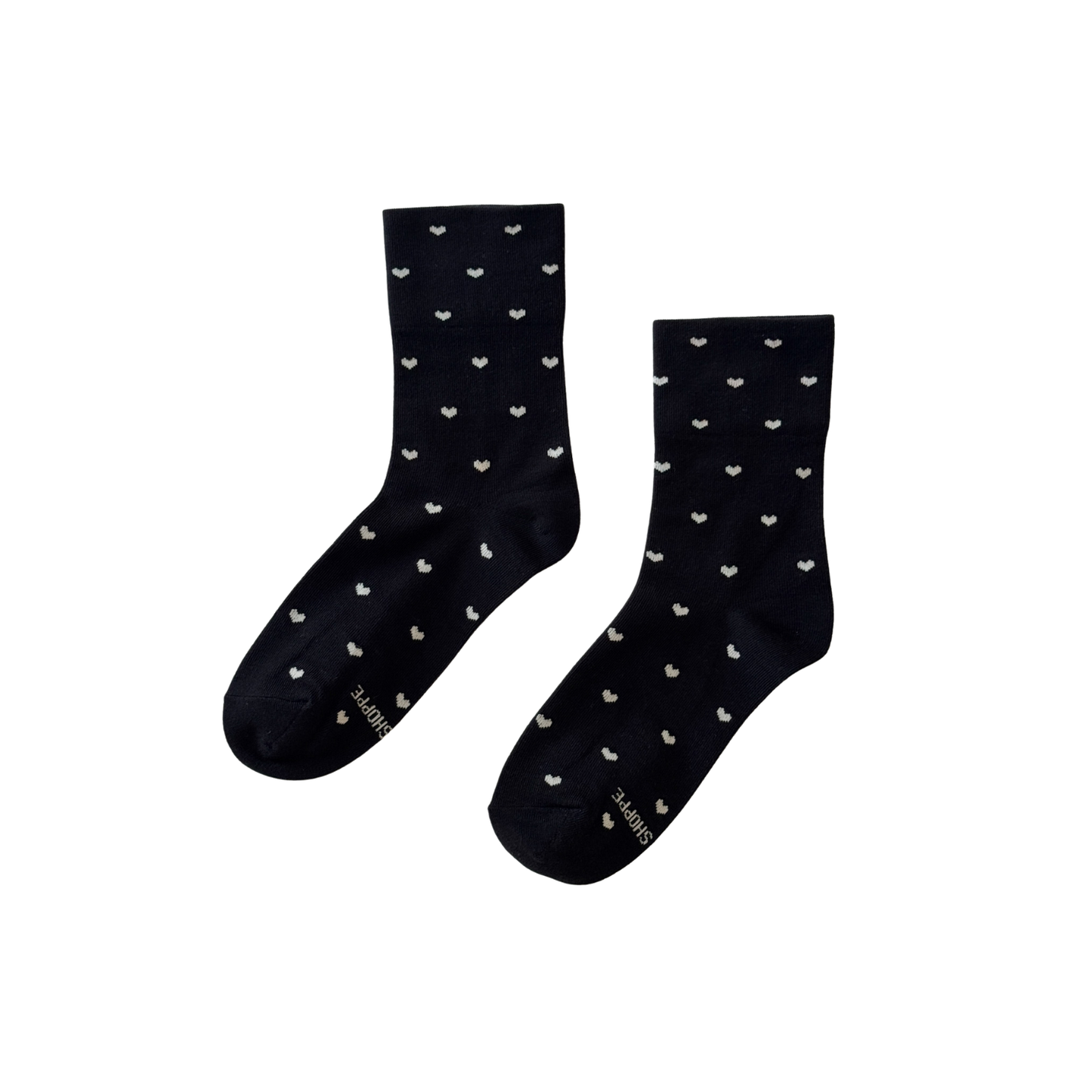 Black sneaker socks with small cream heart pattern