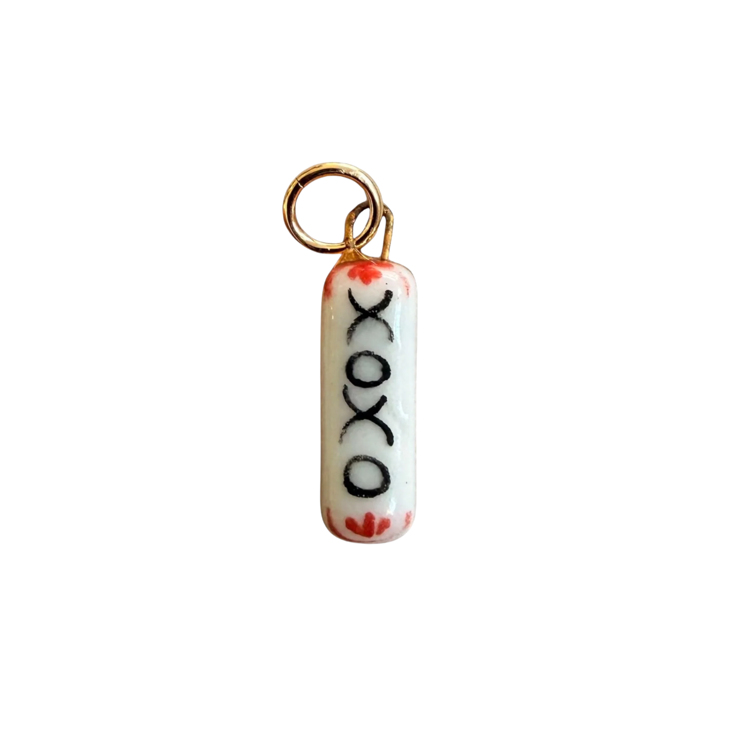 Porcelain charm bar keychain with "xoxo" print and red accents, gold ring loop