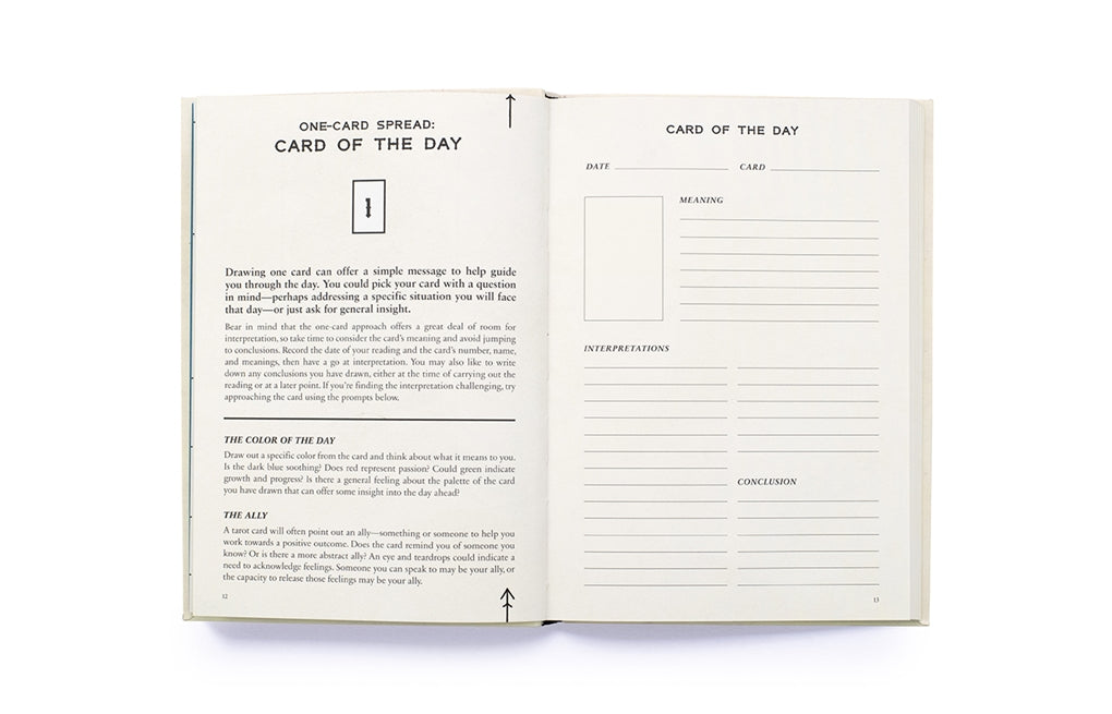 Open tarot journal spread with “One-card spread” and “Card of the Day” lines