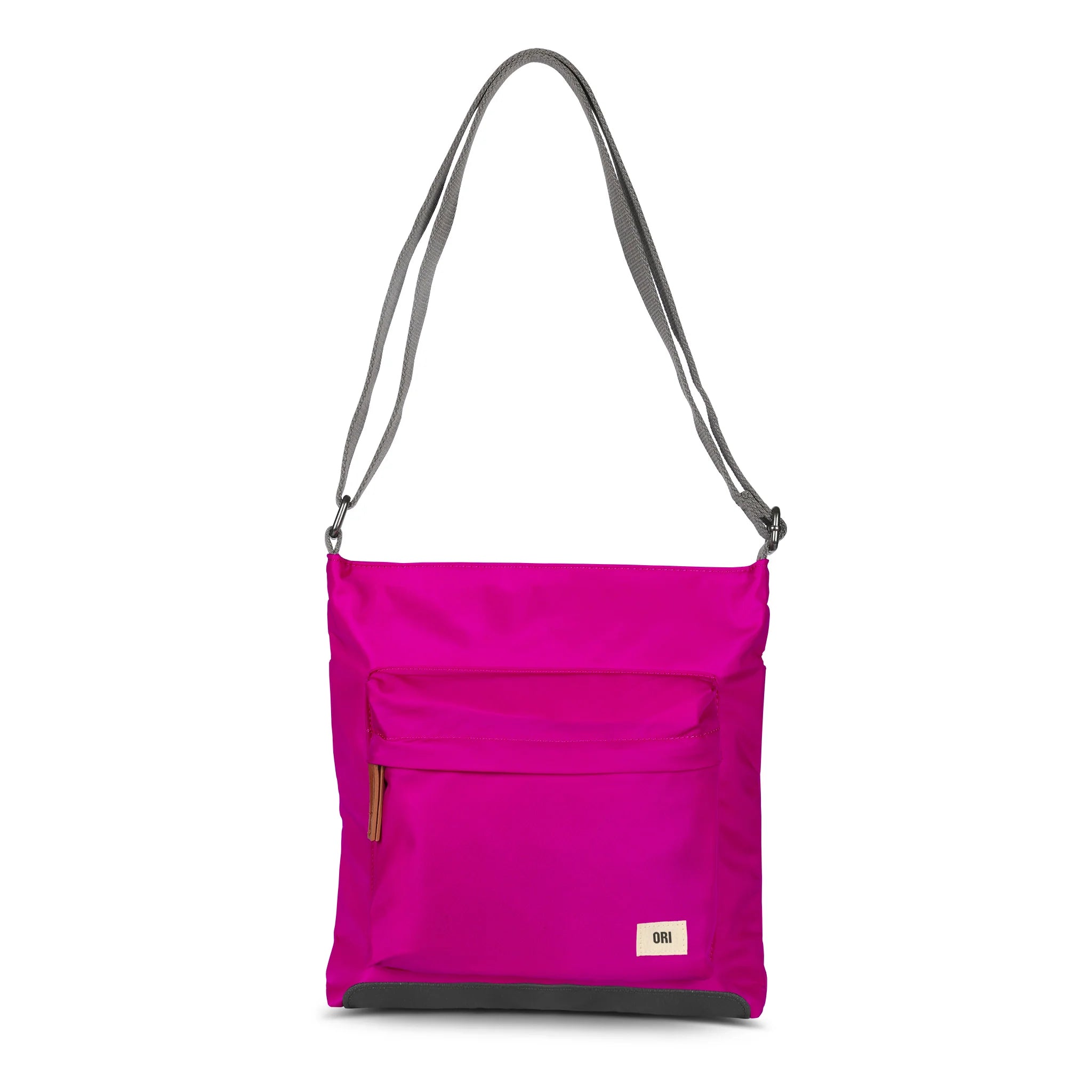 Sustainable nylon crossbody bag in bright magenta with zip front pocket