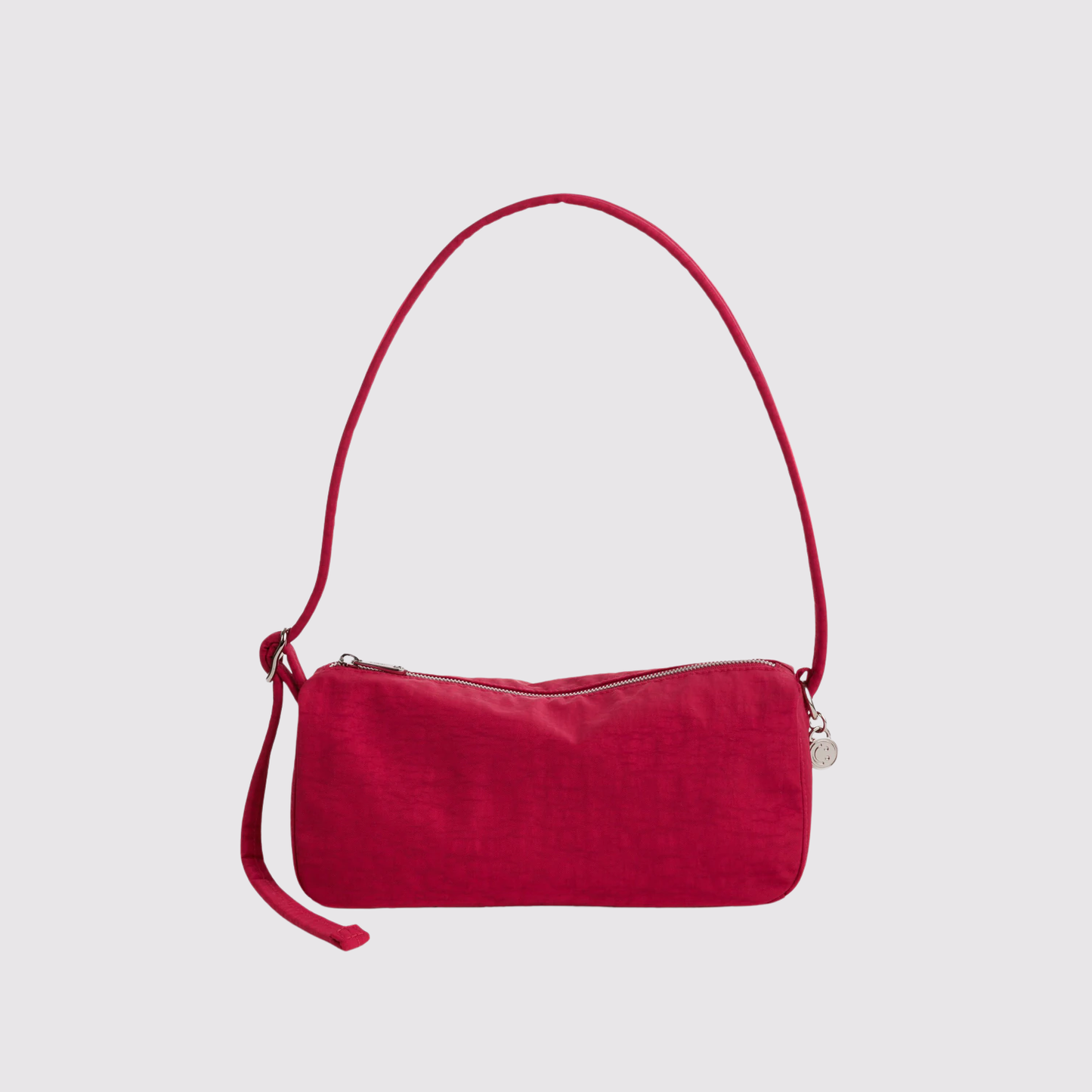 Red nylon loaf bag with curved top handle and zip-top pocket