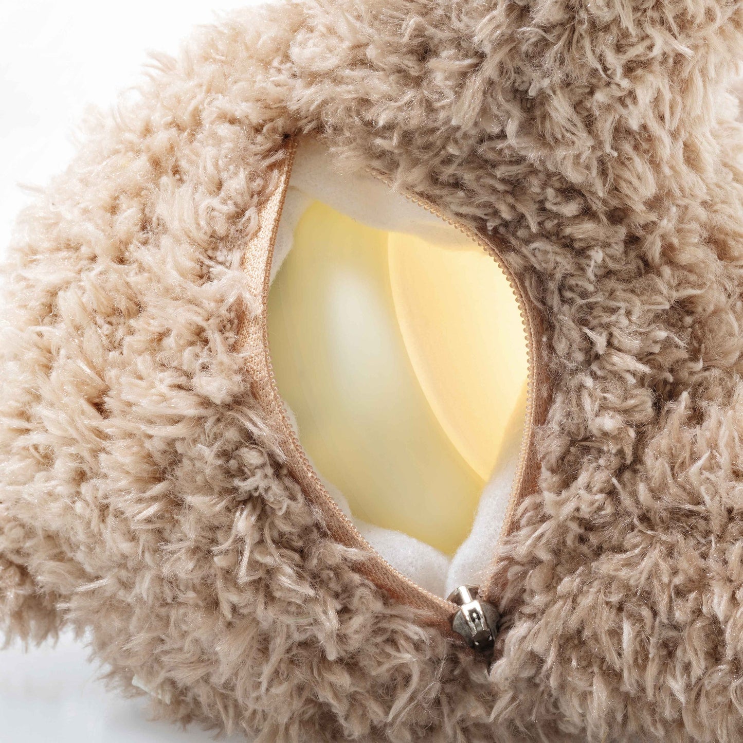 Light at Night Caspar teddy bear, tan plush jacket open to show warm light inside